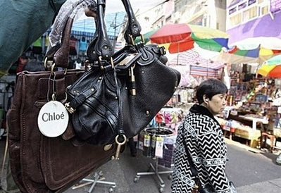 Designer goods counterfeiters return to NYC's Chinatown