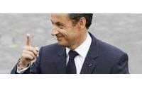 Sarkozy rub shoulders on best-dressed list