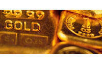 Gold scores record high at 1,245 dollars an ounce