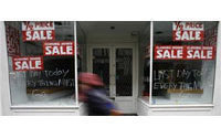 UK retail sales up, hot weather helps