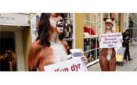 Strip-freeze: Nearly naked anti-fur protesters brave cold