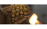 India gold buying recoils as prices breach $1,400