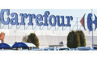 Carrefour broadens action plan after H1 profit dive
