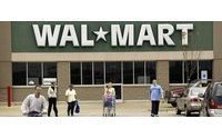 Wal-Mart trims some U.S. health coverage
