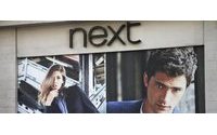 Retailer Next says 'procedural oversight' led to law breach