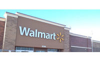 Wal-Mart cuts outlook