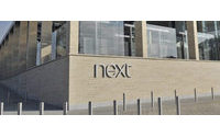 Next raises full-year guidance on strong trading