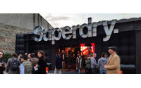 Superdry owner reports jump in first-half profit‍​