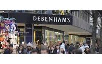Debenhams to cut back promotions after profit drop