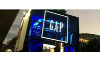 Gap to raise hourly pay to $10 in 2015; Wal-Mart remains 'neutral'