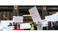 Striking Cartier workers protest at Paris store