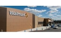 Wal-Mart predicts sales will grow faster next year