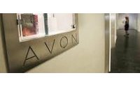Avon slashes dividend as profit plunges